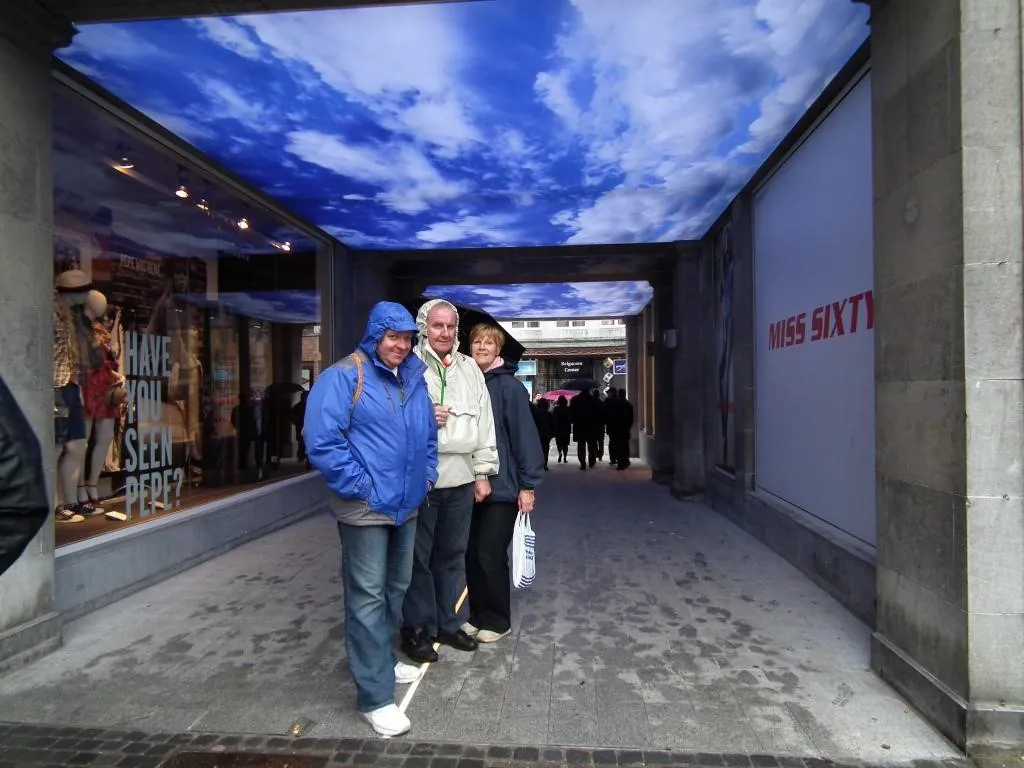 I blue skies in wet brugges